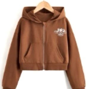 This is a very cute, brown, Y2K zip-up that’s perfect for the upcoming season!